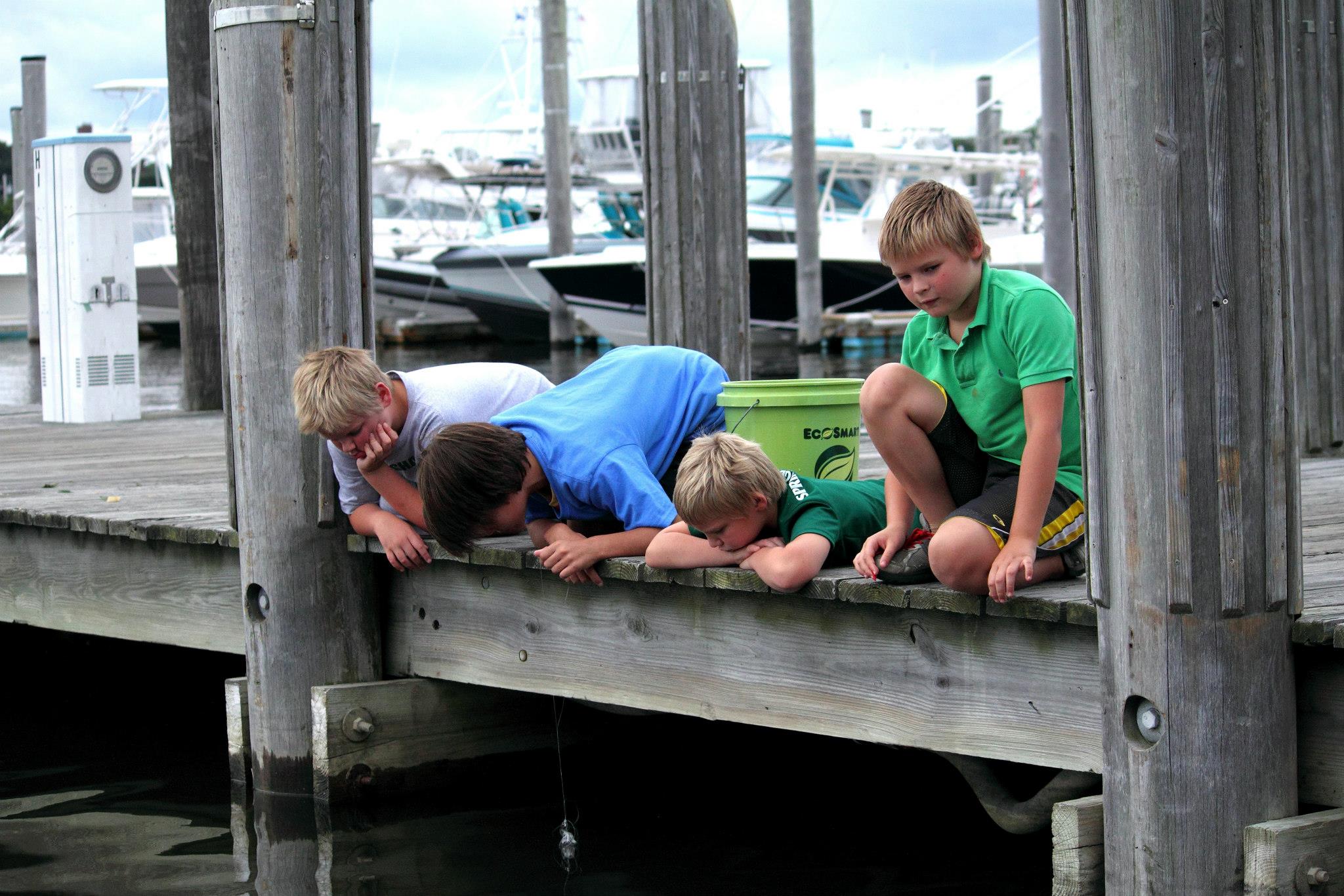 Perry Olson’s sons together on a dock